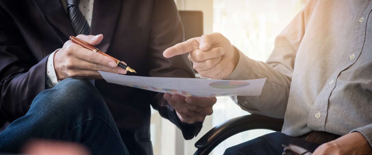 Man Signing Paper